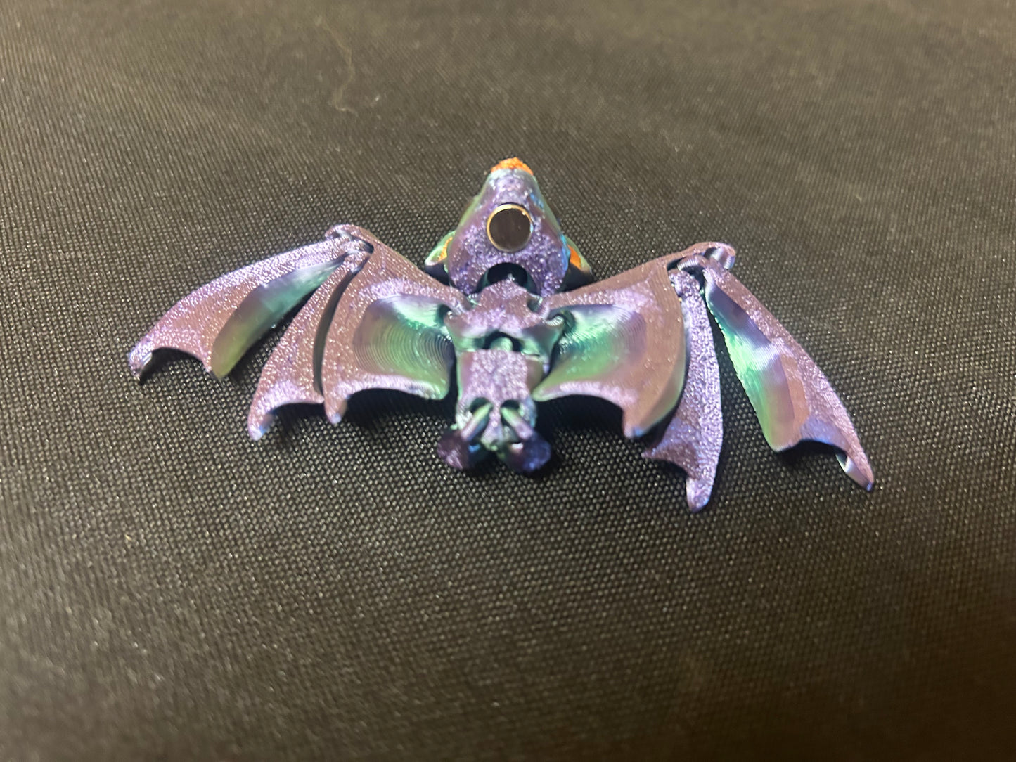 Tiny, Articulated Bat Magnets