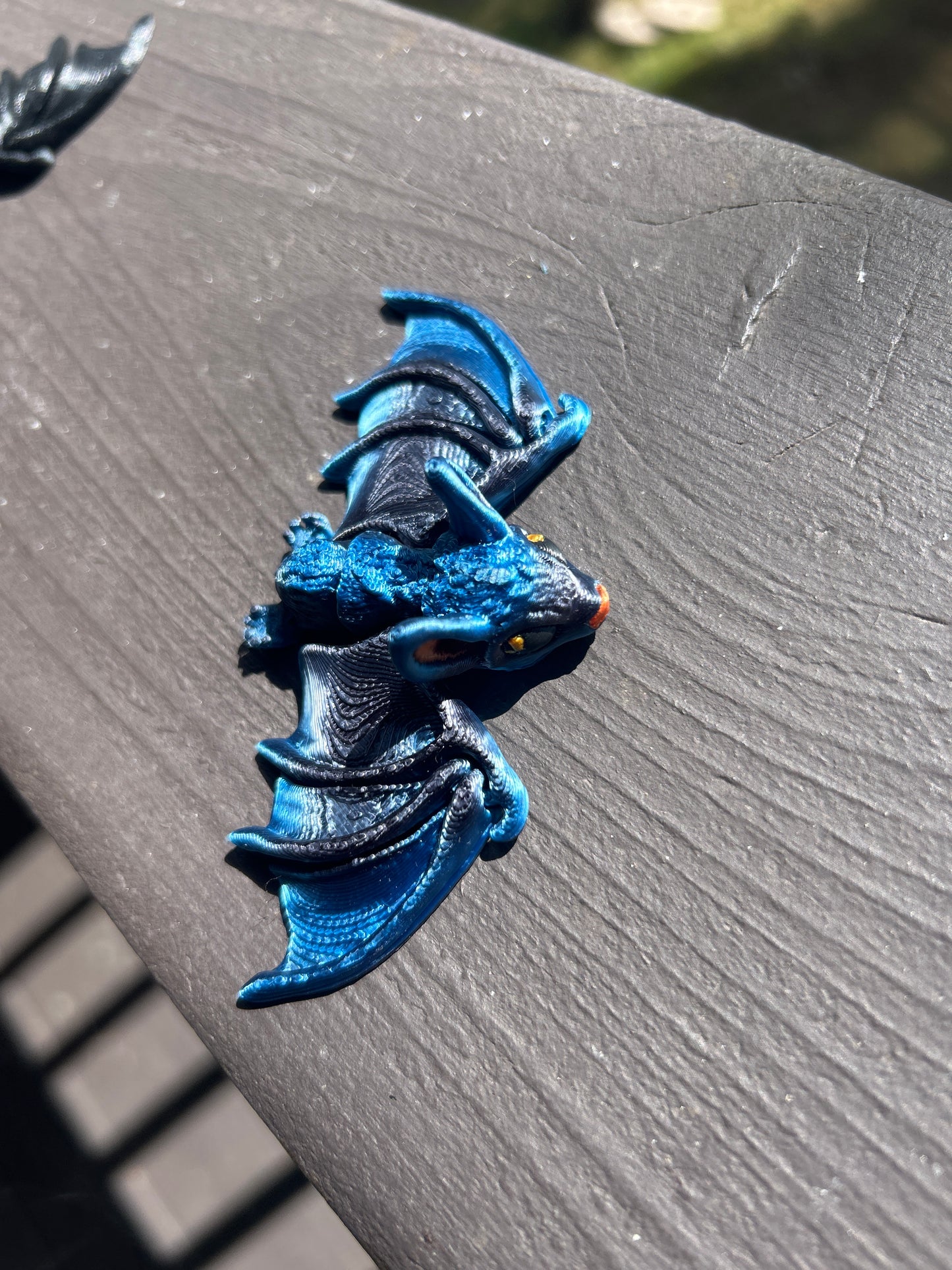 Tiny, Articulated Bat Magnets