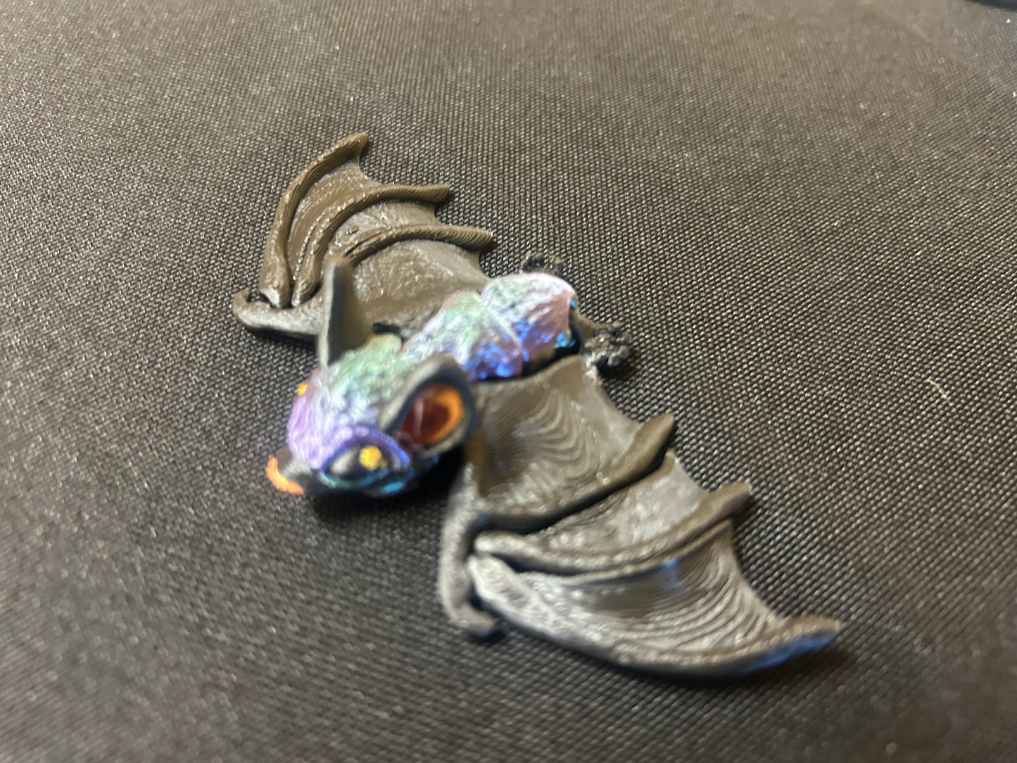 Tiny, Articulated Bat Magnets